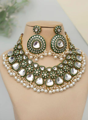 MELANI BORSA KUNDAN POLKI JEWELLERY SET WITH MAANGTIKKA